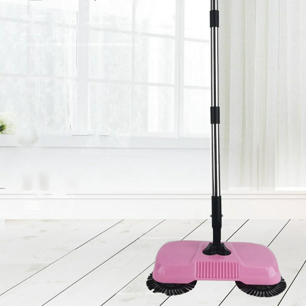 La aspiradora de fregona limpia alfombras en el suelo de la sala de