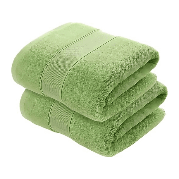 un conjunto de de colores toallas para ducha y spa en el estante