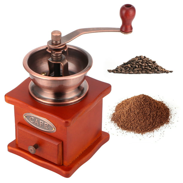 Molinillo de café manual vintage con grano de café
