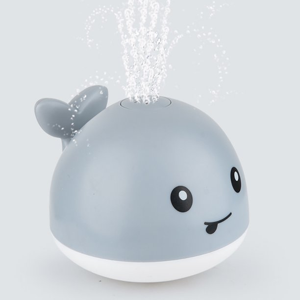 Learning Curve - Juguetes de baño de bebé, figura de ballena con luz LED y  rociador de agua. Juguetes rociadores de agua para niños y niñas pequeños