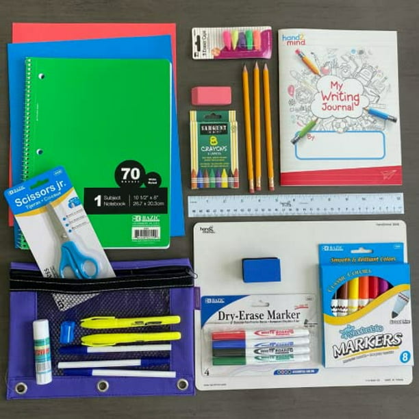 Set de útiles escolares para comenzar las clases: cuaderno, lápices,  acuarelas, reglas, colores. Útiles escolares vistos desde arriba. Regreso a  clases. Photos