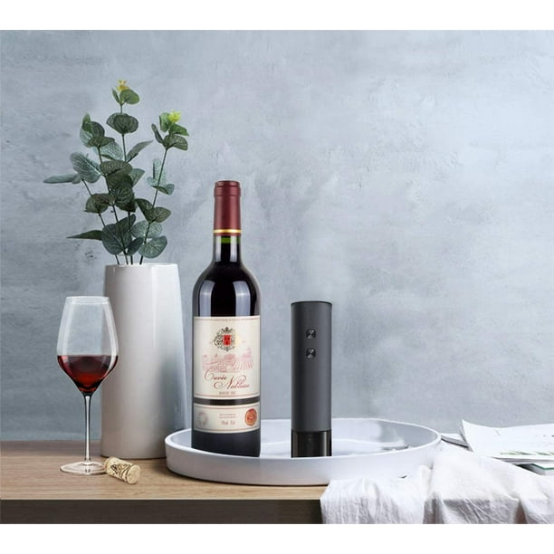  Abridor eléctrico para botellas de vino de Oster, Plateado :  Hogar y Cocina
