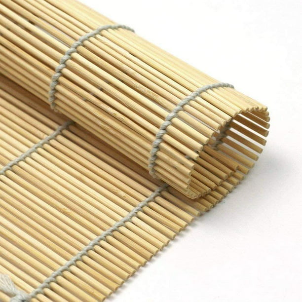 Rollos De Sushi En La Estera De Bambú Jeringuilla Del Concepto Design Cocina  Japonesa Imagen de archivo - Imagen de asia, cena: 112289589