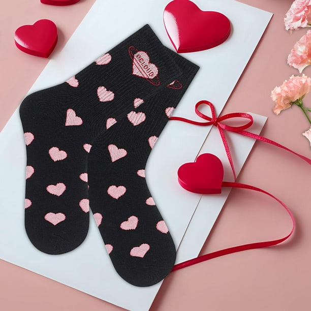 Calcetines for Sale con la obra «Las nutrias marinas se dan la mano, el  amor, el día de San Valentín» de DesignsBySaxton