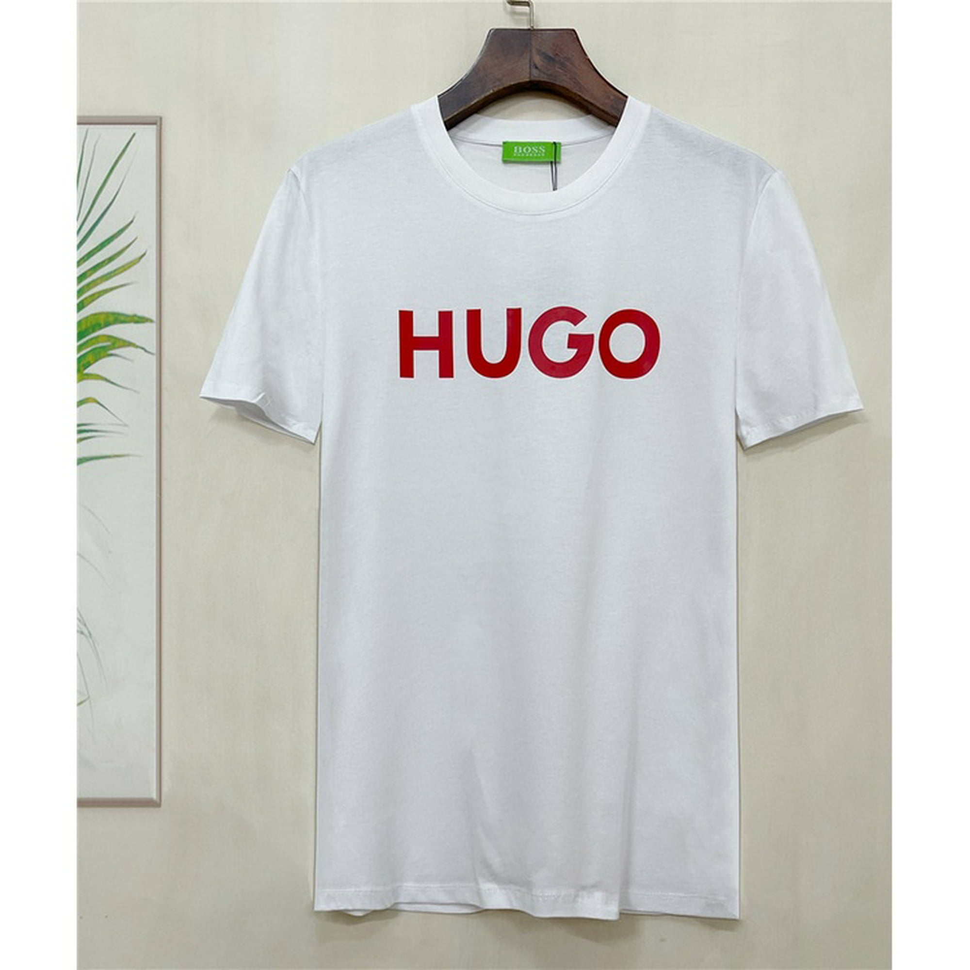 PLAYERA BLANCA HUGO BOSS MANGA Y HOMBRO CON LETRAS.