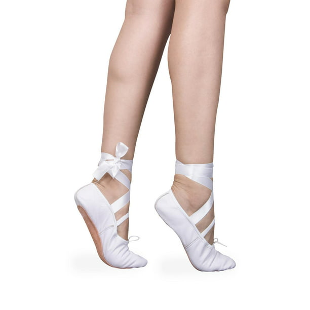 Cuadro de cristal Zapatillas de ballet blancas piernas de la mujer 