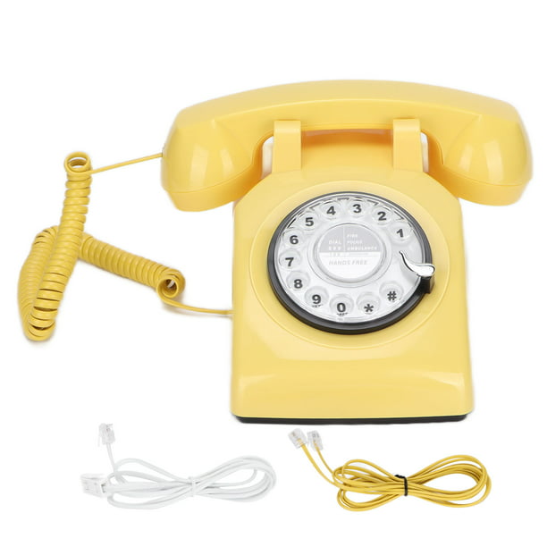Teléfono vintage con esfera giratoria teléfono amarillo