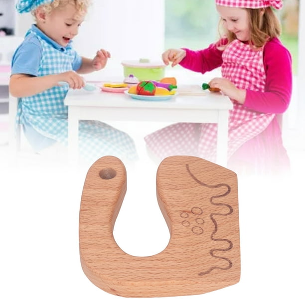 Juguete de niño. juguete de madera para niños. cuchillo de chef
