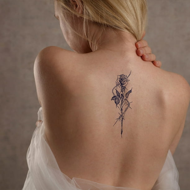 Tatuajes Femeninos - Tatuaje en medio de la espalda/Spine tattoo
