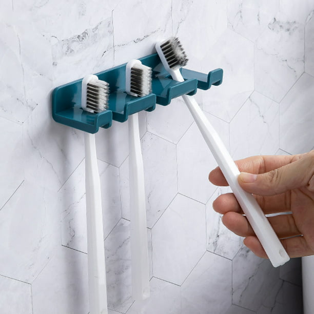  2 soportes autoadhesivos para cepillos de dientes montados en  la pared, gancho para cepillos de dientes a prueba de agua, 2 en 1 con  colgador para cepillos de dientes y portavasos