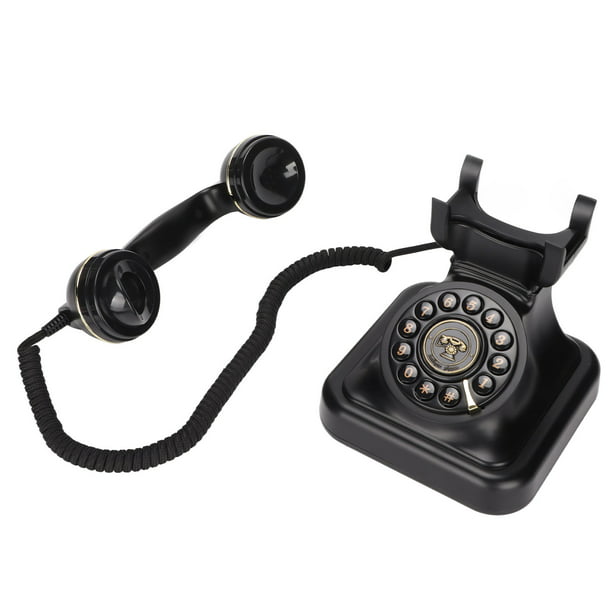 Vintage antiguo teléfono fijo de plástico negro brillante con dial